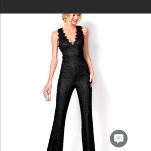 Black open back jump suit worn once